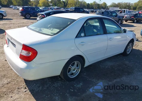 2002 Toyota Camry Le from USA, damaged, VIN 4T1BE32K82U042045